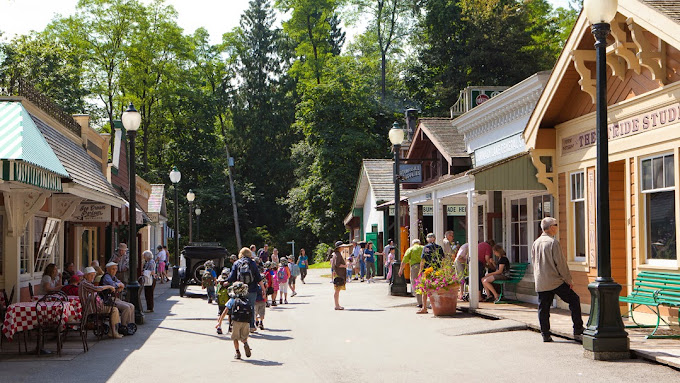 Historic heritage street with restored shops and wooden storefronts in a BC village